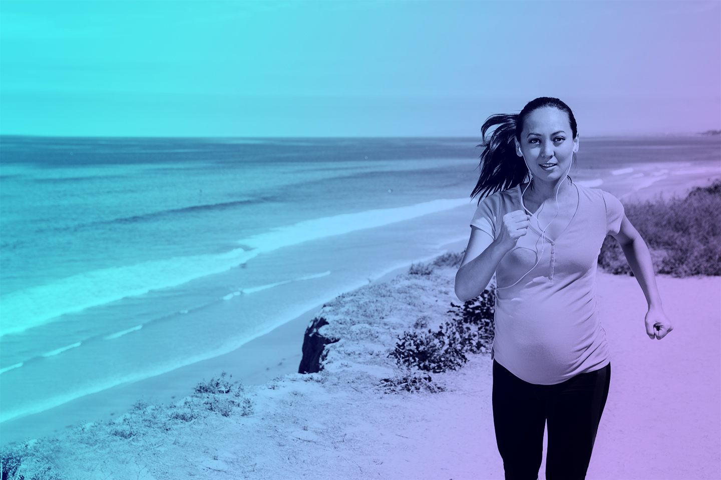 Pregnant woman going for a jog at the beach