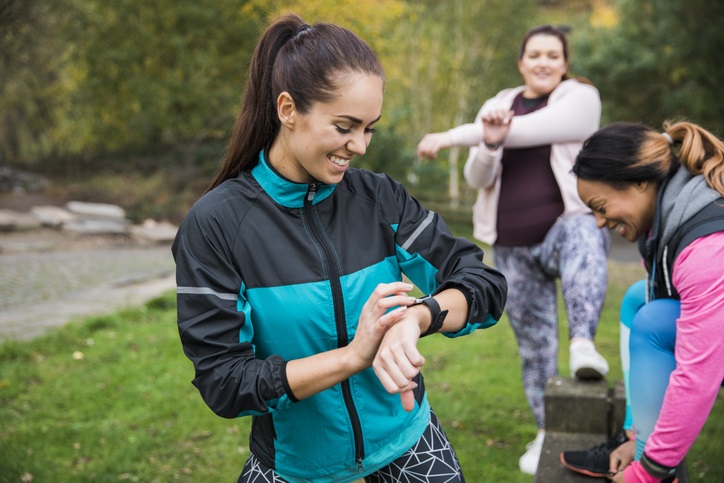 A Group Of Friends Prepare For A Run