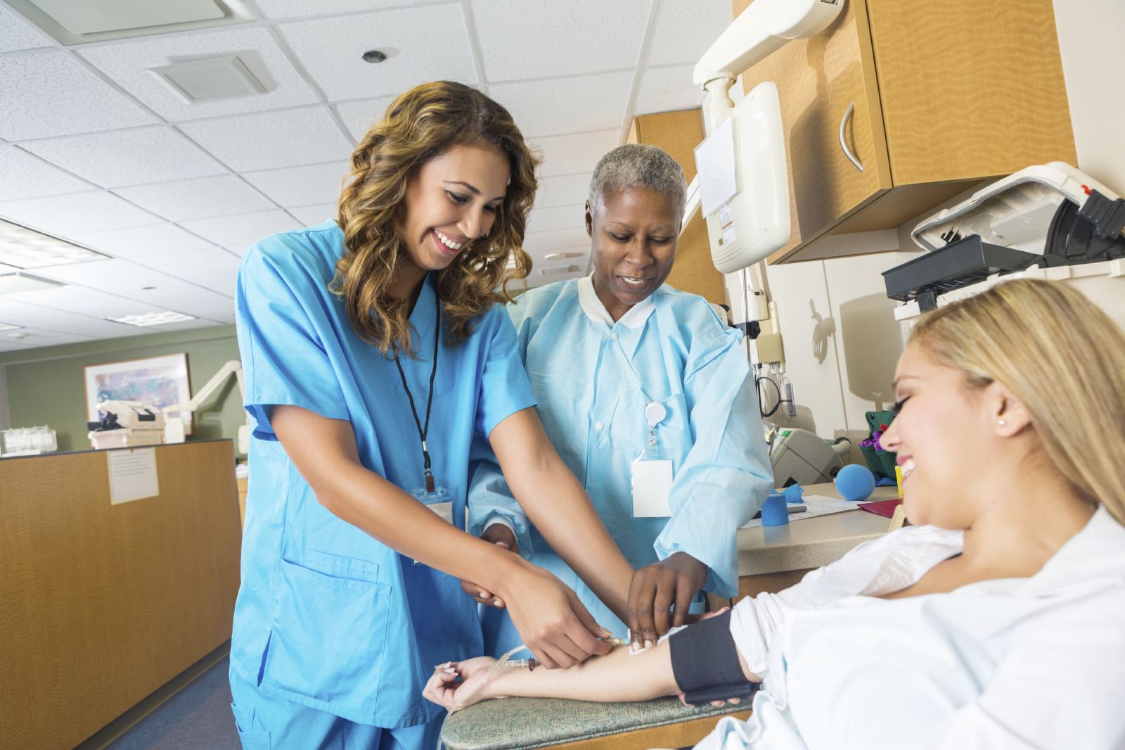 Nurse Drawing Blood Work from Patient